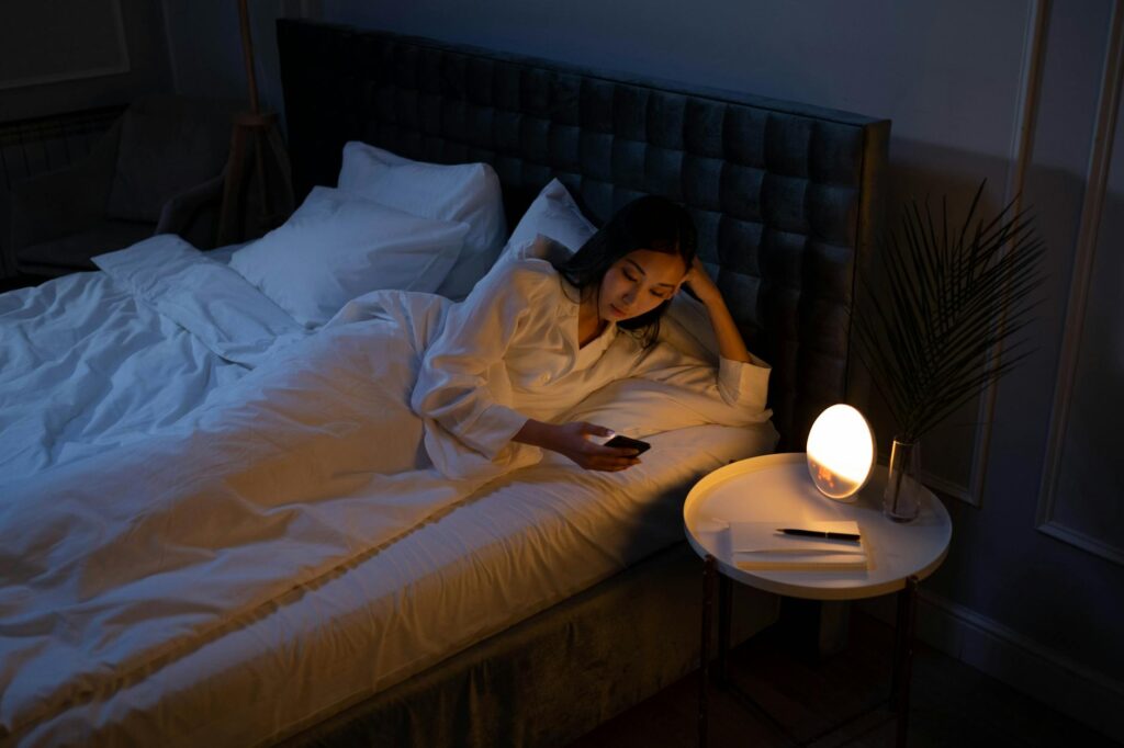 woman lying on the bed