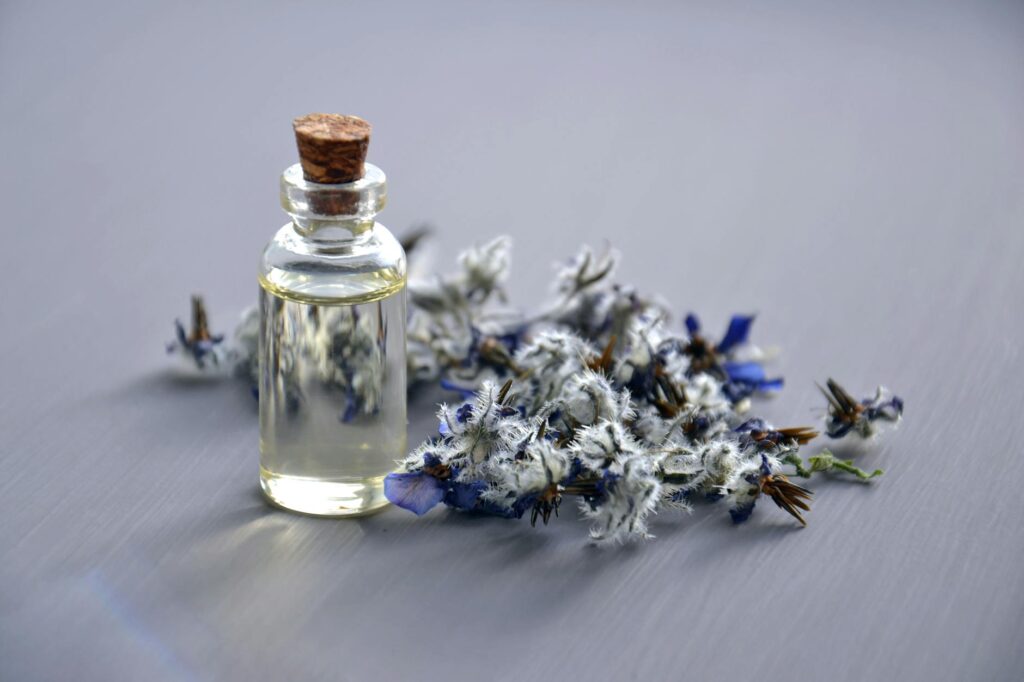 selective focus photo of bottle with cork lid